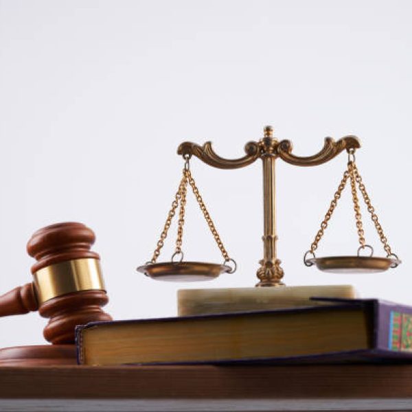 gavel hammer and holy koran against white background – sharia law concept gavel hammer and holy koran against white background - sharia law concept